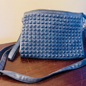 Navy blue handbag.